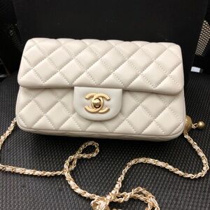Chanel Beige Quilted Crossbody Bag with Gold Chain